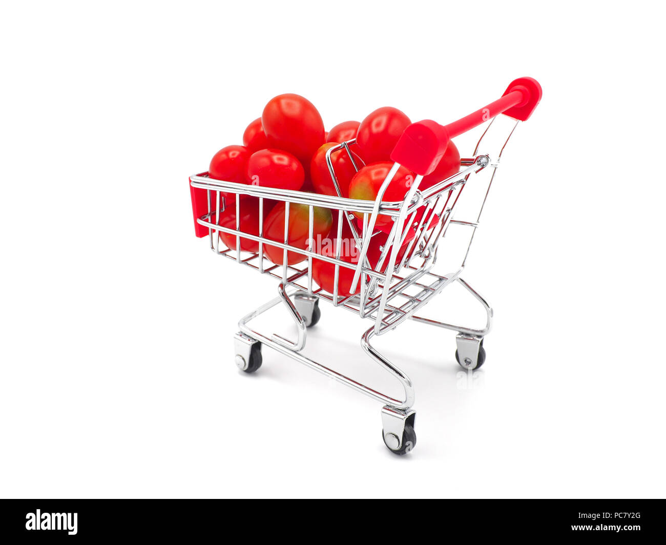 Mosti di uve fresche o pomodoro ciliegino in trolley su sfondo bianco. Foto Stock
