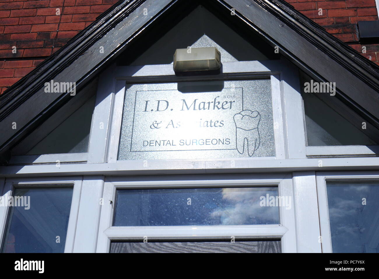 Marcatore I.D & Associates chirurgo dentista Foto Stock
