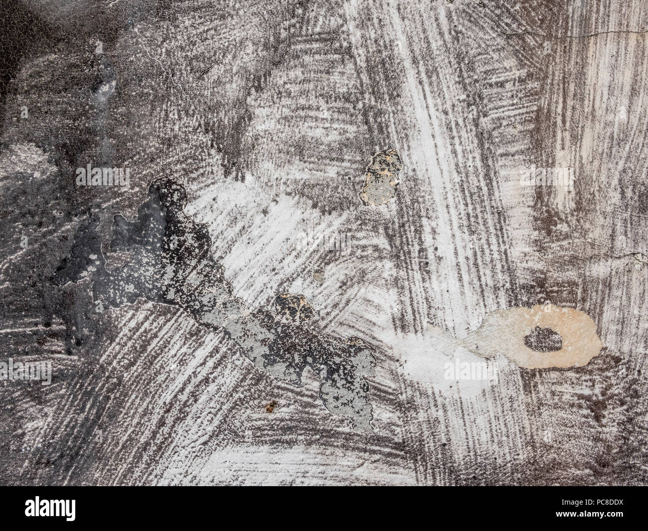 Ruvido e sporco texture di vernice sulle pareti esterne di una casa. La vecchia vernice texture. Foto Stock