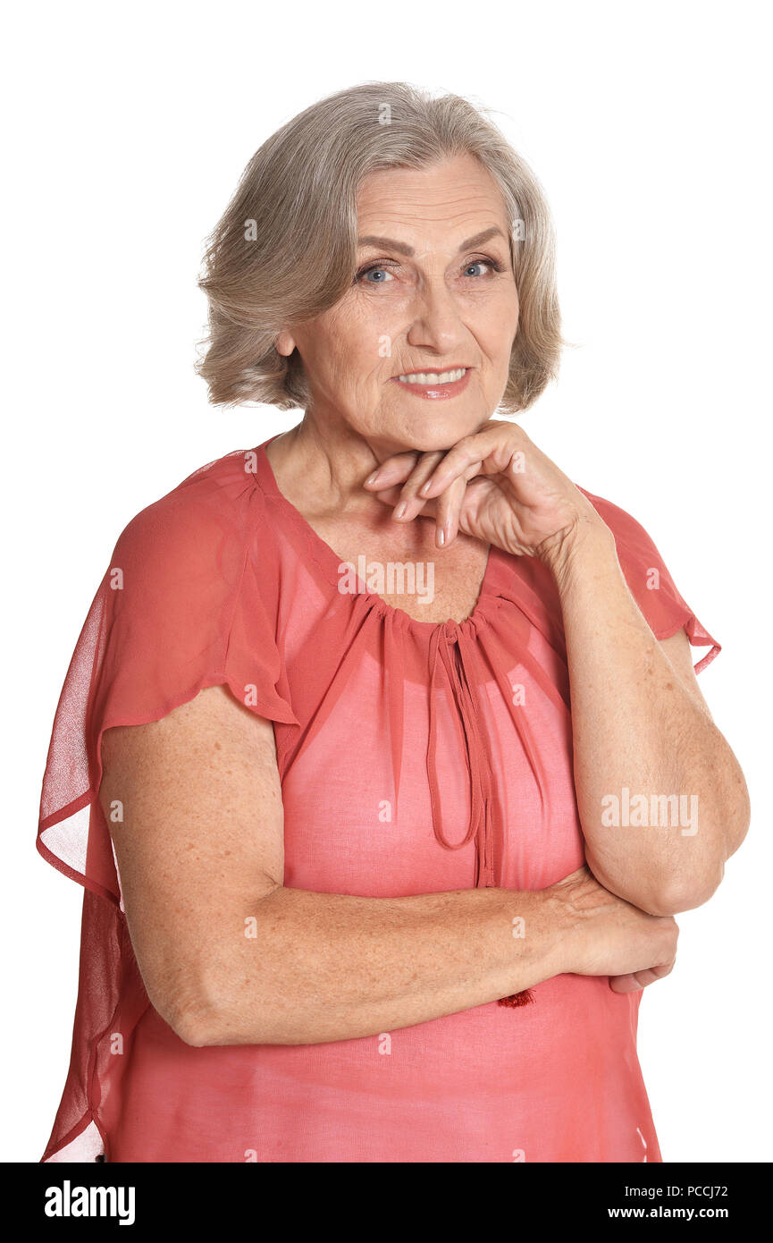 Ritratto di donna senior in blu camicetta in posa Foto Stock