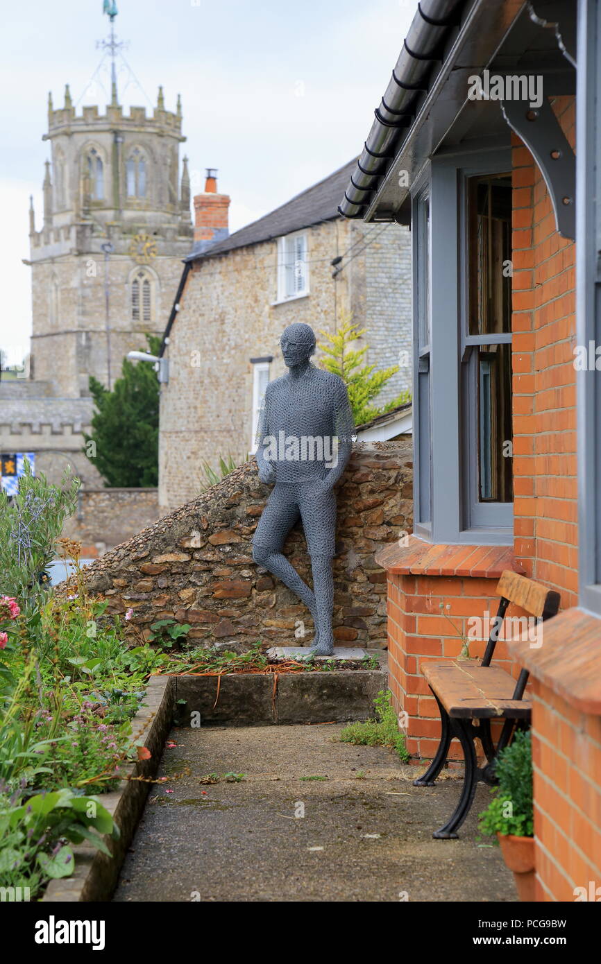 Scultura realizzata con filo di pollo nella città di Colyton in East Devon Foto Stock