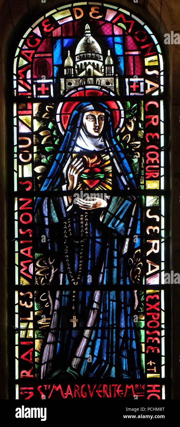 Santa Margherita Maria Alacoque, finestra di vetro colorato nella Basilica del Sacre Coeur, dedicata al Sacro Cuore di Gesù a Parigi, Francia Foto Stock