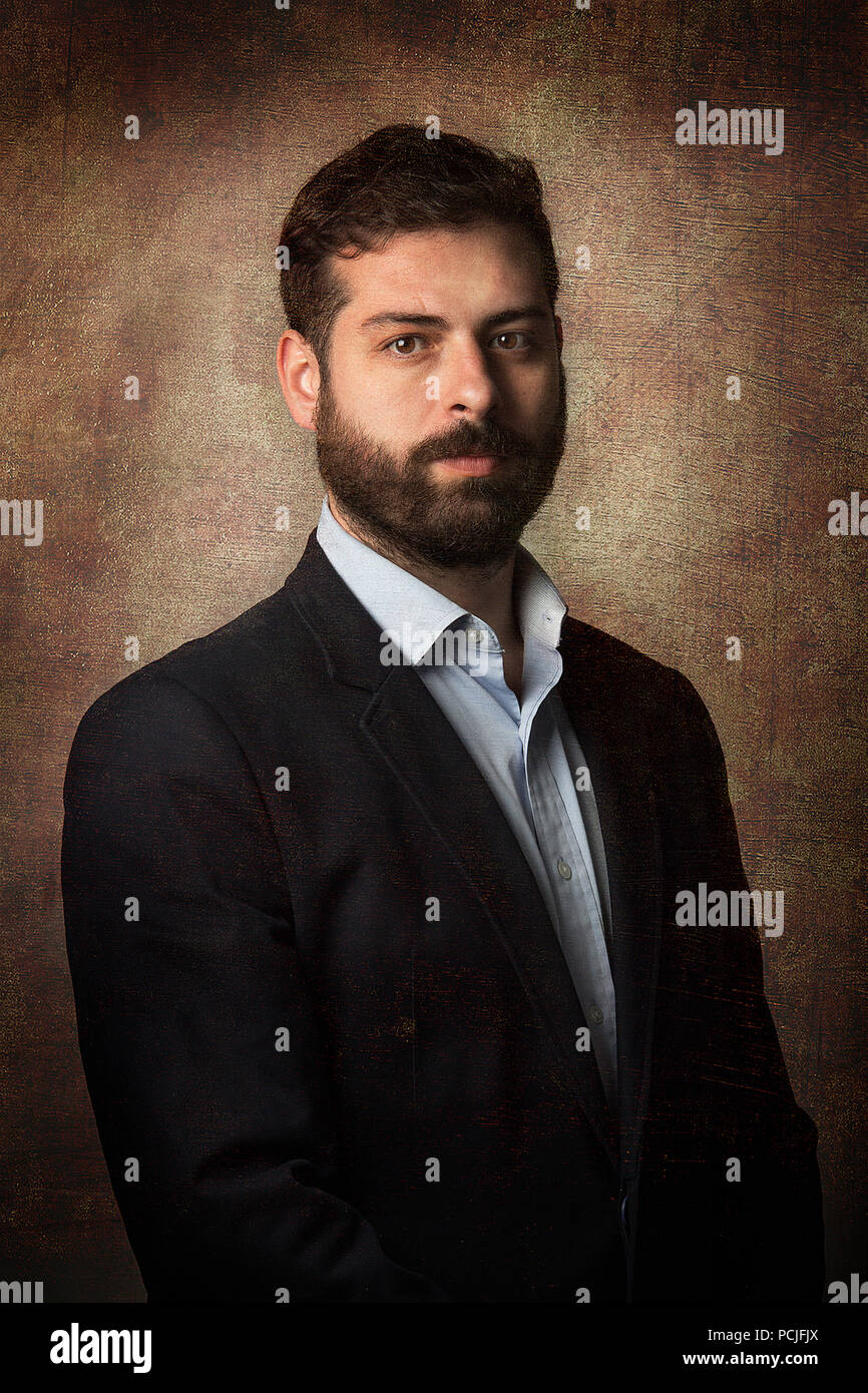 Ritratto di un uomo con la barba in un vestito Foto Stock