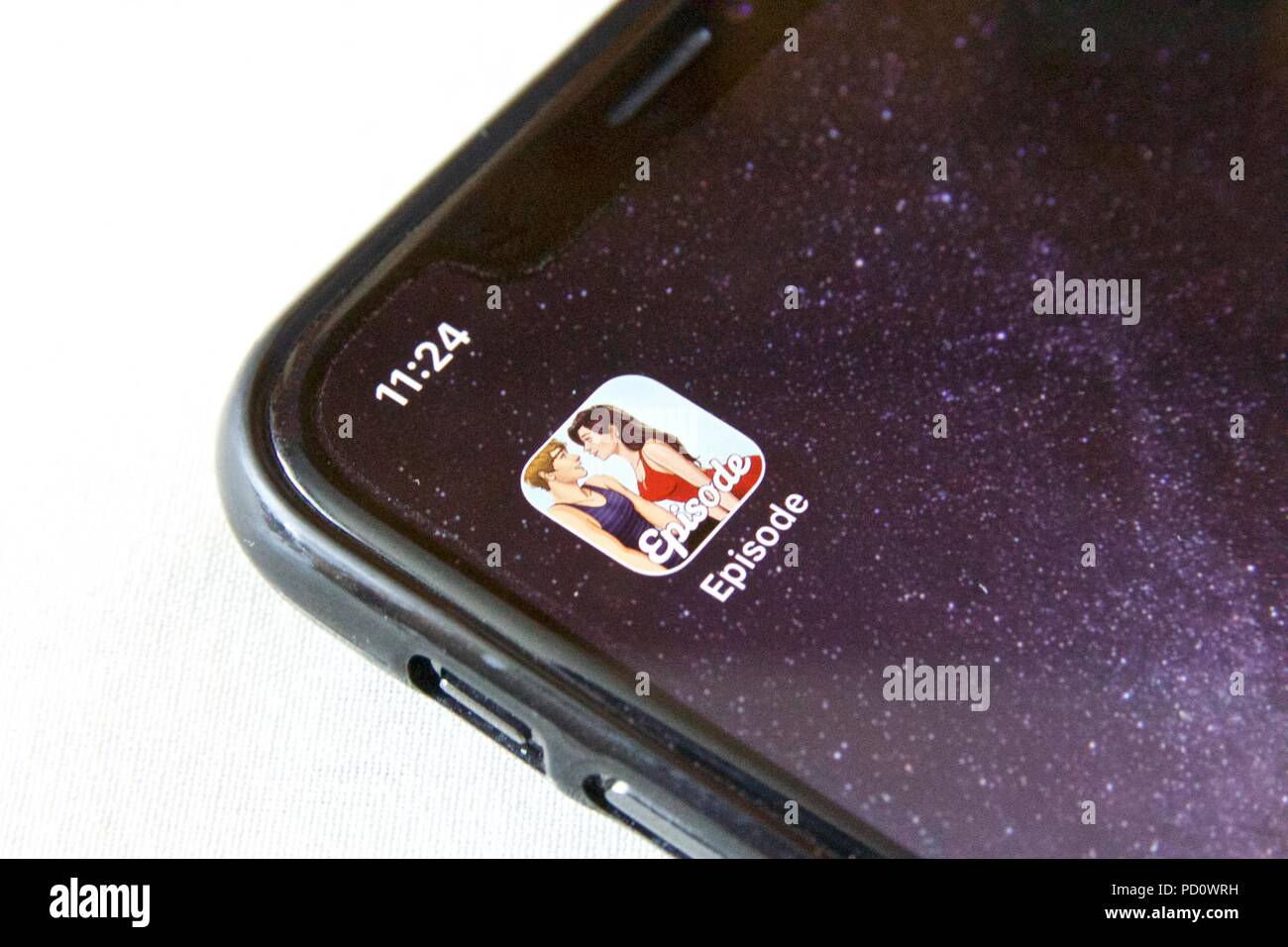 L'icona dell'app per Storia interattiva gioco 'episodio - Scegli la tua storia' fatta da Pocket Gems, su un iPhone X contro uno sfondo bianco Foto Stock