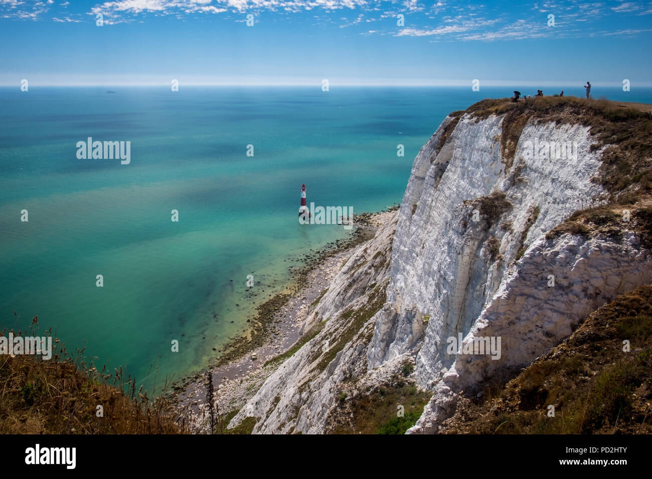 Le persone che si godono il sole e caldo clima estivo a Beachy Head in East Sussex, Regno Unito Foto Stock