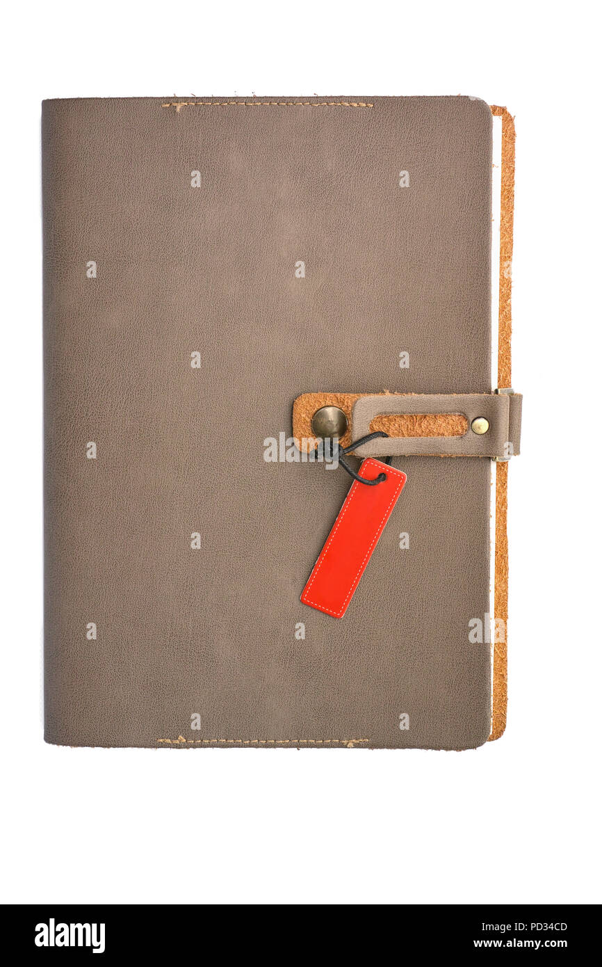In cuoio bianco coperchio del notebook con tag su sfondo bianco Foto Stock