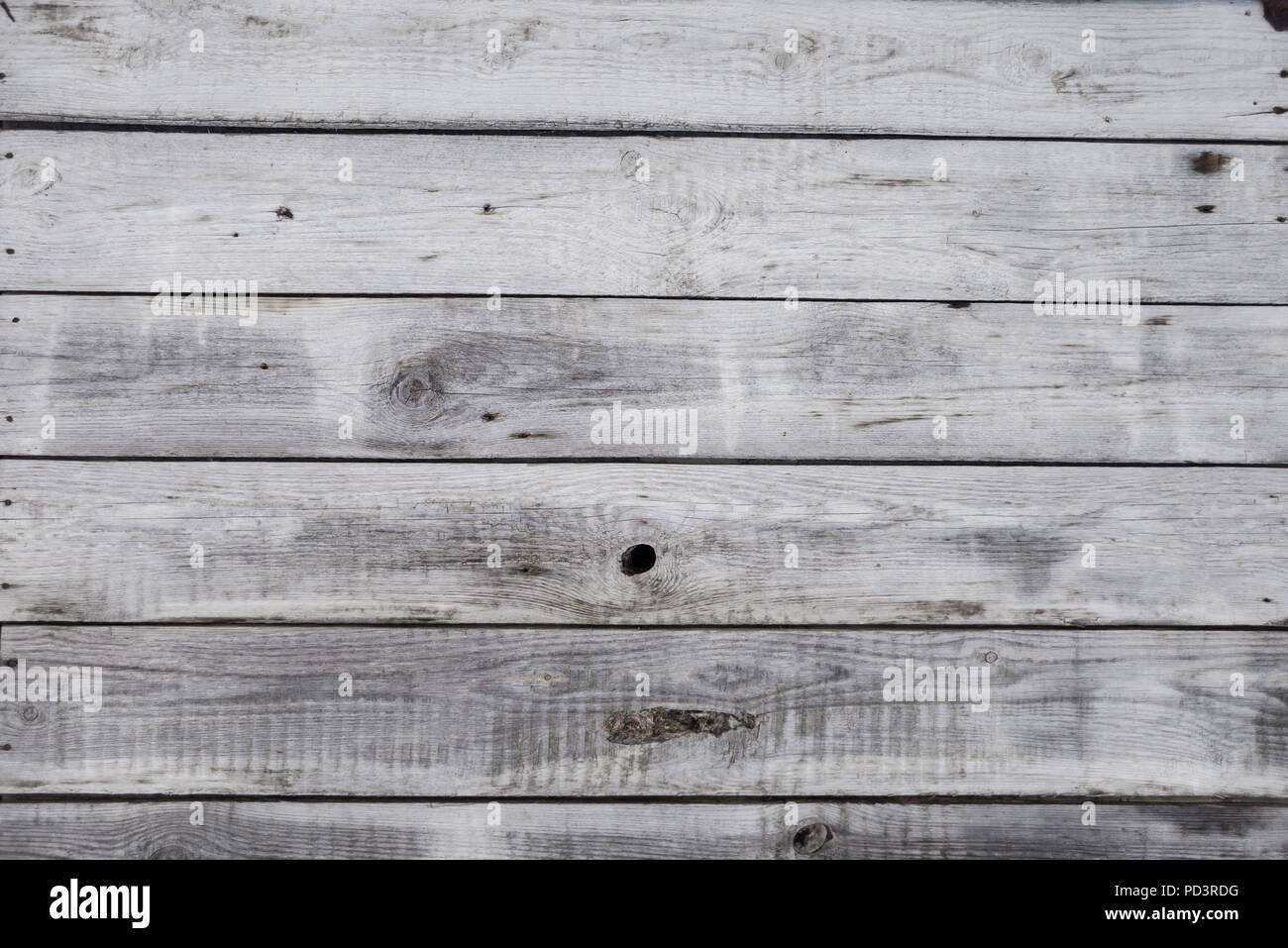 Sfondo di colore grigio alterato non verniciata orizzontale di tavole di legno Foto Stock