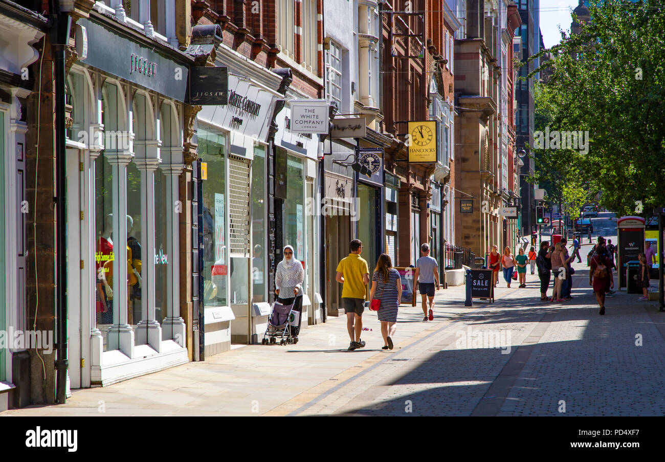 Negozi di King Street nel centro della città di Manchester Foto Stock