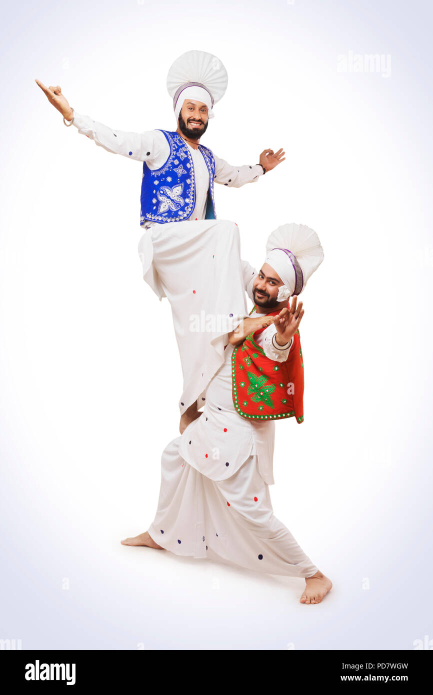 Gli uomini di religione sikh divertendosi Foto Stock