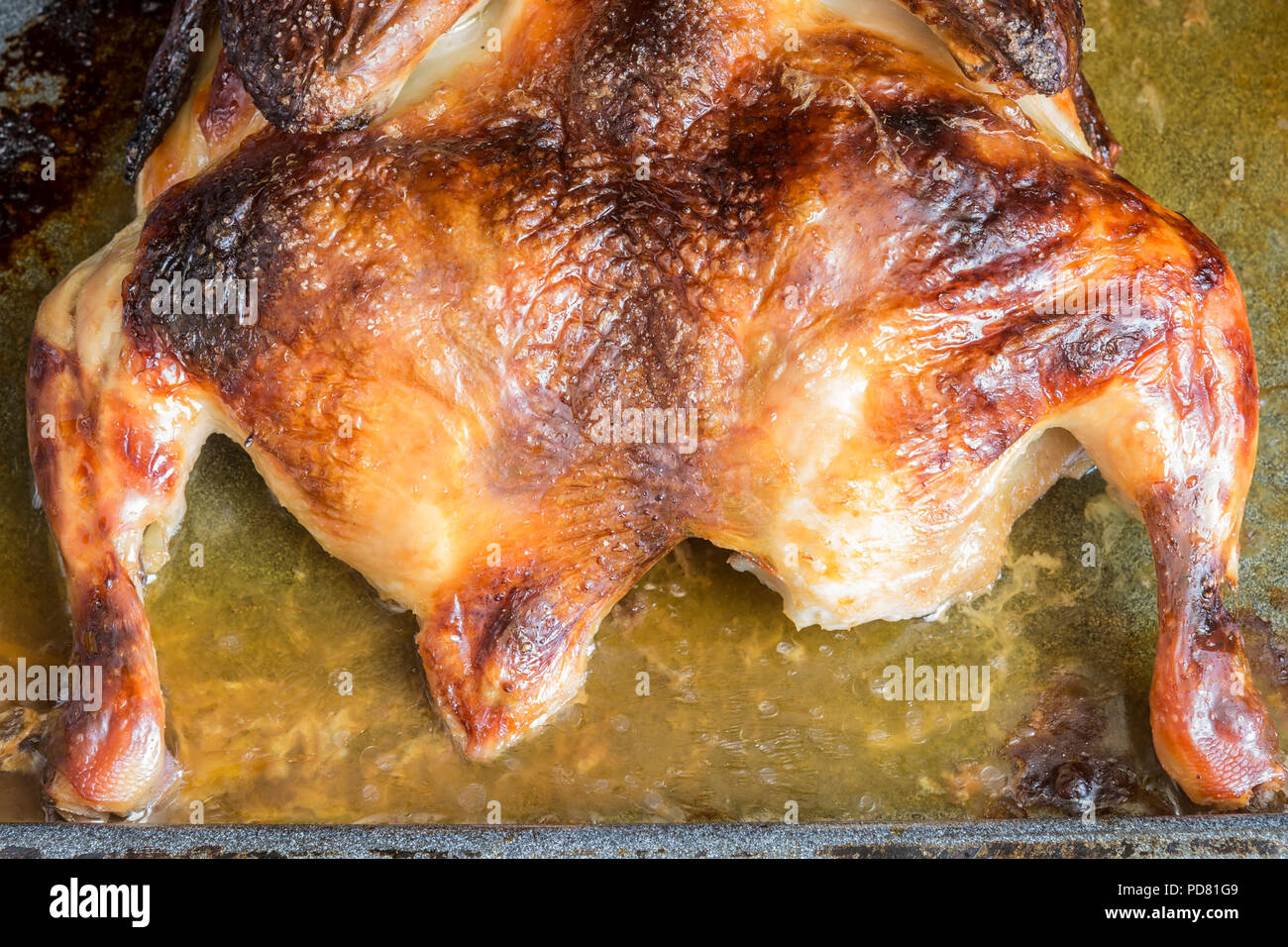 Il pollo cotto in forno. Foto Stock
