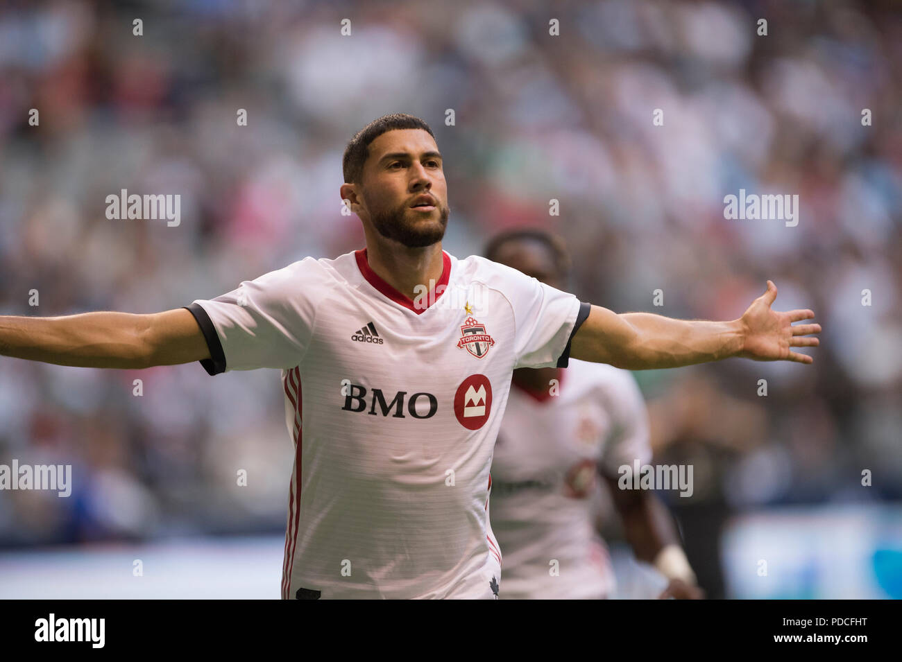 Vancouver, Canada. 8 agosto 2018. Jonathan Osorio (21) di Toronto FC, dopo un goal contro il Whitecaps. Il gioco termina in pareggio per 2-2. Vancouver Whitecaps vs Toronto FC BC Place. © Gerry Rousseau/Alamy Live News Foto Stock