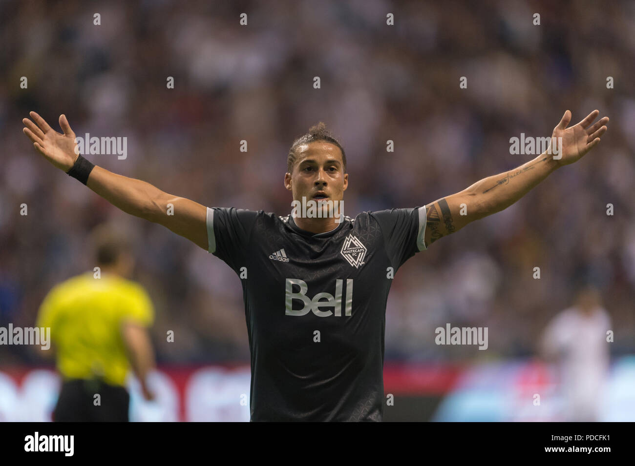 Vancouver, Canada. 8 agosto 2018. Erik Hurtado (19) di Vancouver Whitecaps, mantiene le sue braccia fuori per la folla dopo un goal. Il gioco termina in pareggio per 2-2. Vancouver Whitecaps vs Toronto FC BC Place. © Gerry Rousseau/Alamy Live News Foto Stock