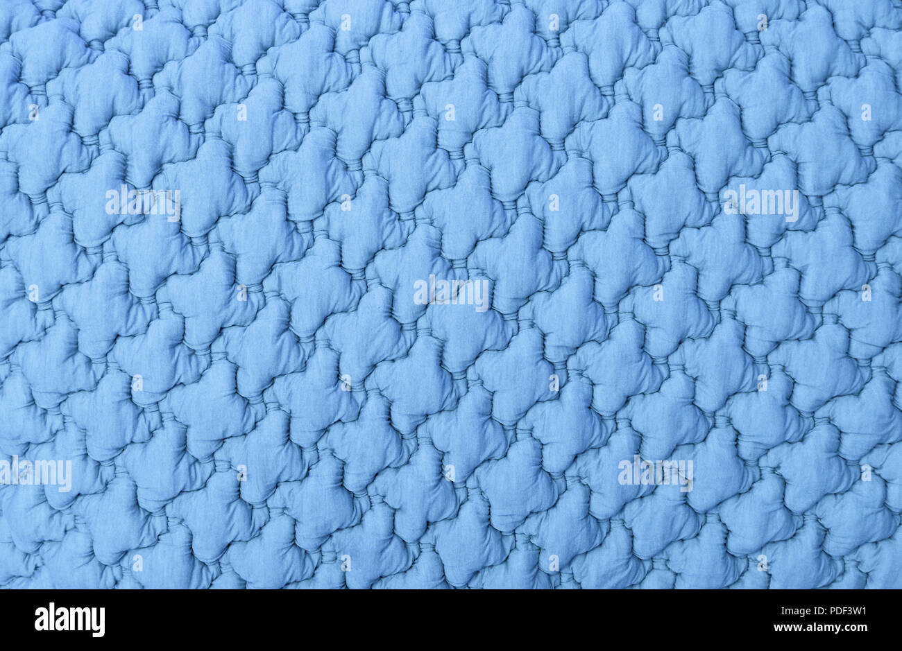 Close up texture di sfondo di blu pastello soffice tessili tufted pattern di tappezzeria Foto Stock