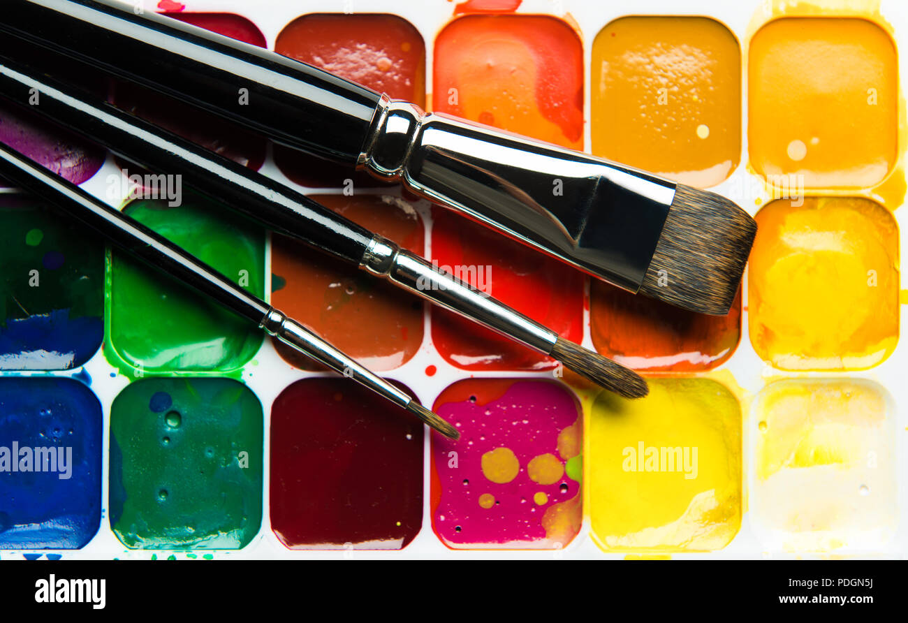 Paintbox acquerello e pennelli close-up Foto Stock