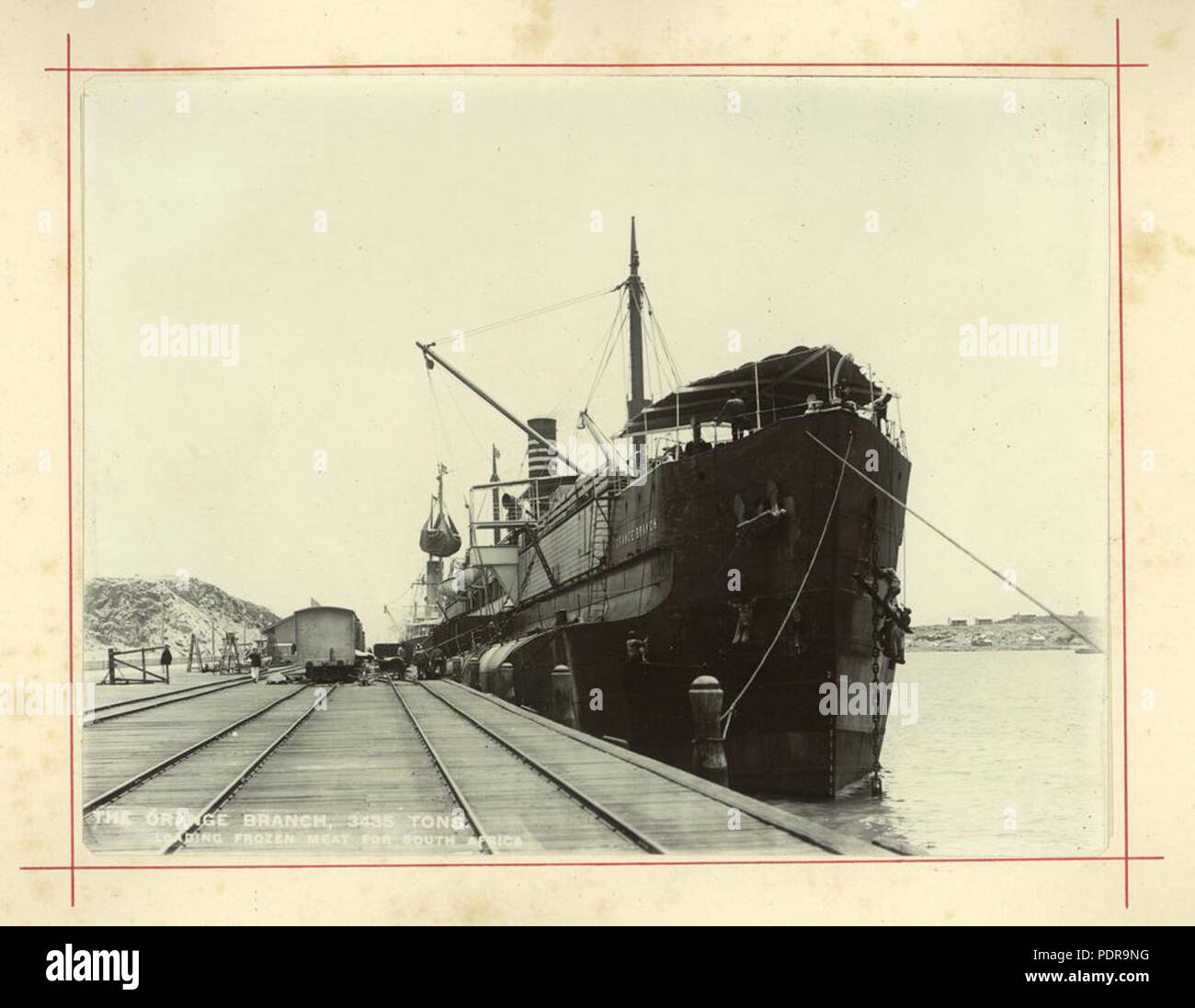 93 StateLibQld 1 234980 cargo carico sul ramo di arancio a Townsville docks Foto Stock