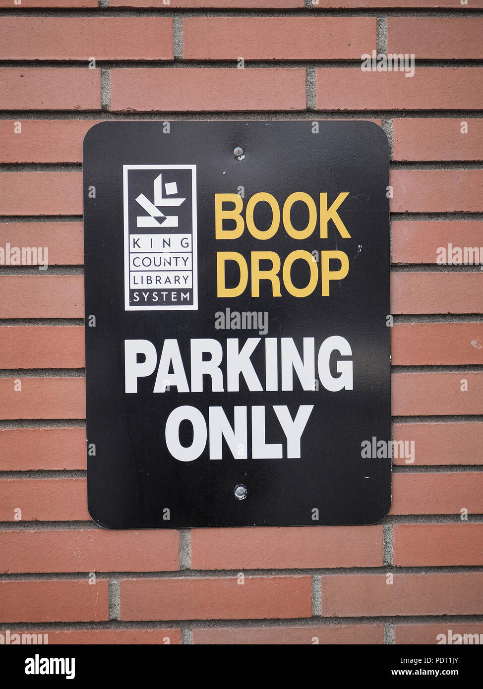 Segno di sola Consegna del libro, biblioteca pubblica di Bothell, WA, USA Foto Stock