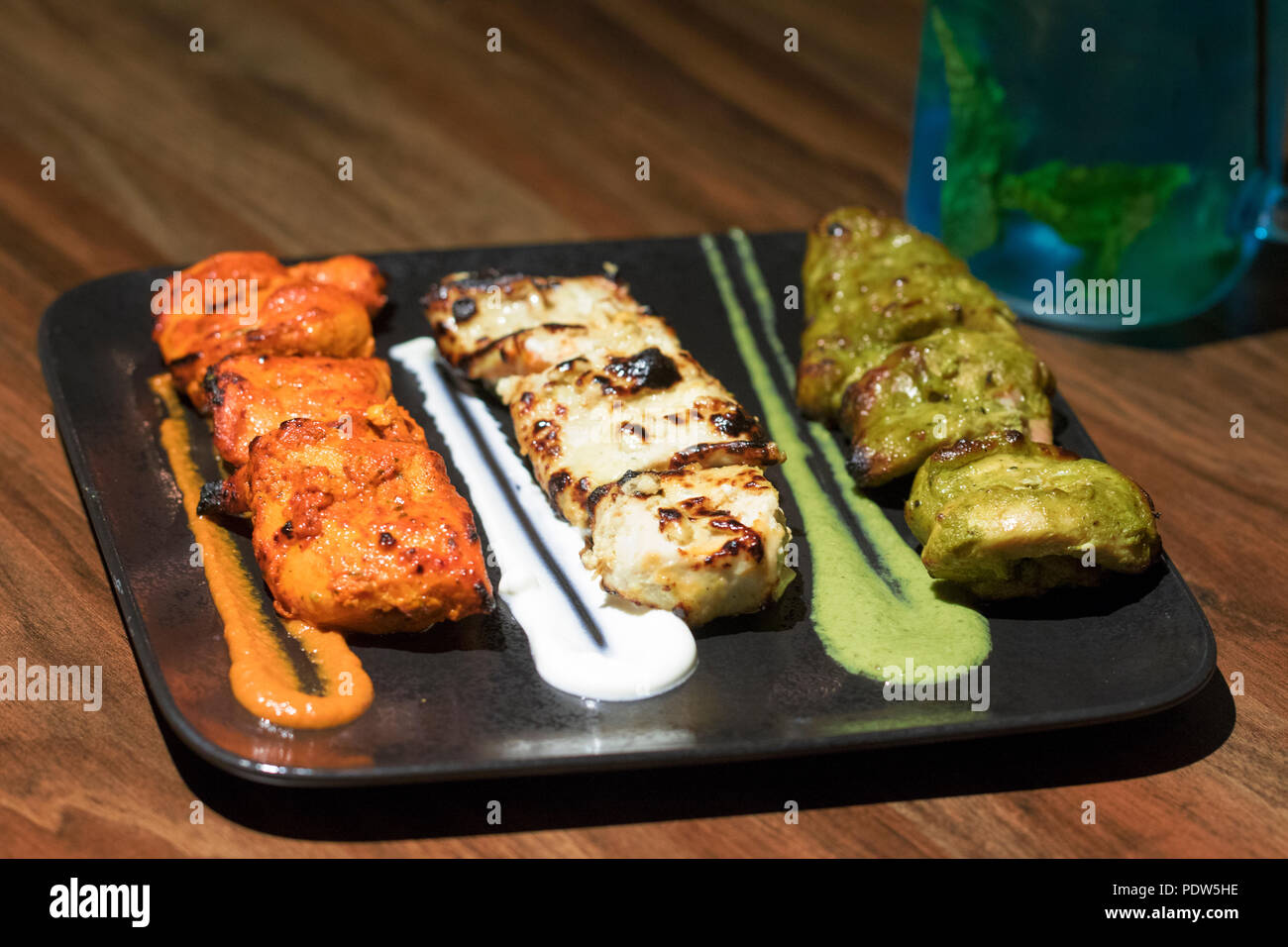 Indipendenza indiana giorno speciale - spiedini di pollo Tikka, Murg Malai kebab e Kebab Haryali. Foto Stock