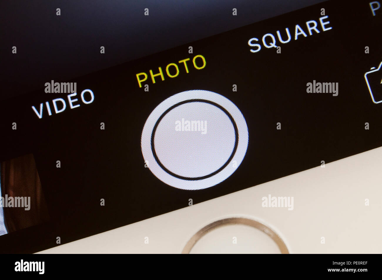 Il pulsante di scatto sulla fotocamera di iPhone app schermo Foto Stock