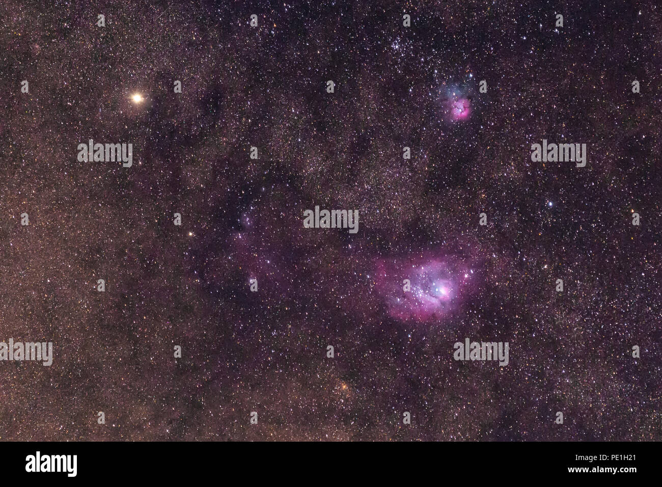 Via lattea dettaglio, Saturno e la Nebulosa Laguna Foto Stock