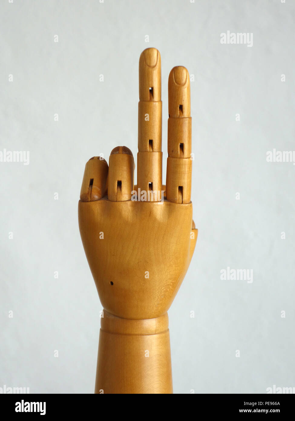 A mano in legno manichino compiendo gesti Foto Stock