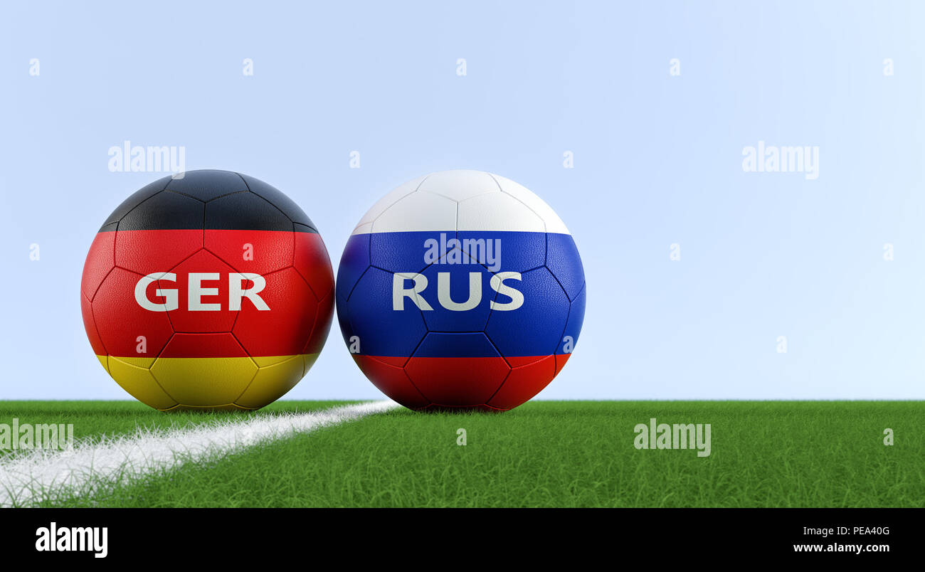 La Germania contro la Russia partita di calcio - palloni da calcio in tedesco e in Russia i colori nazionali su un campo di calcio. Copia dello spazio sul lato destro - il rendering 3D Foto Stock