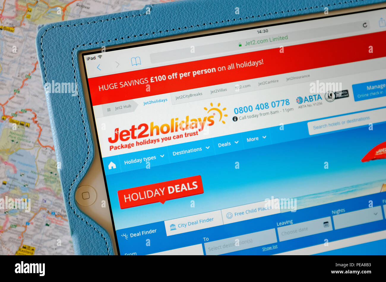 Getto 2 vacanze website homepage su tablet sullo schermo del computer Foto Stock