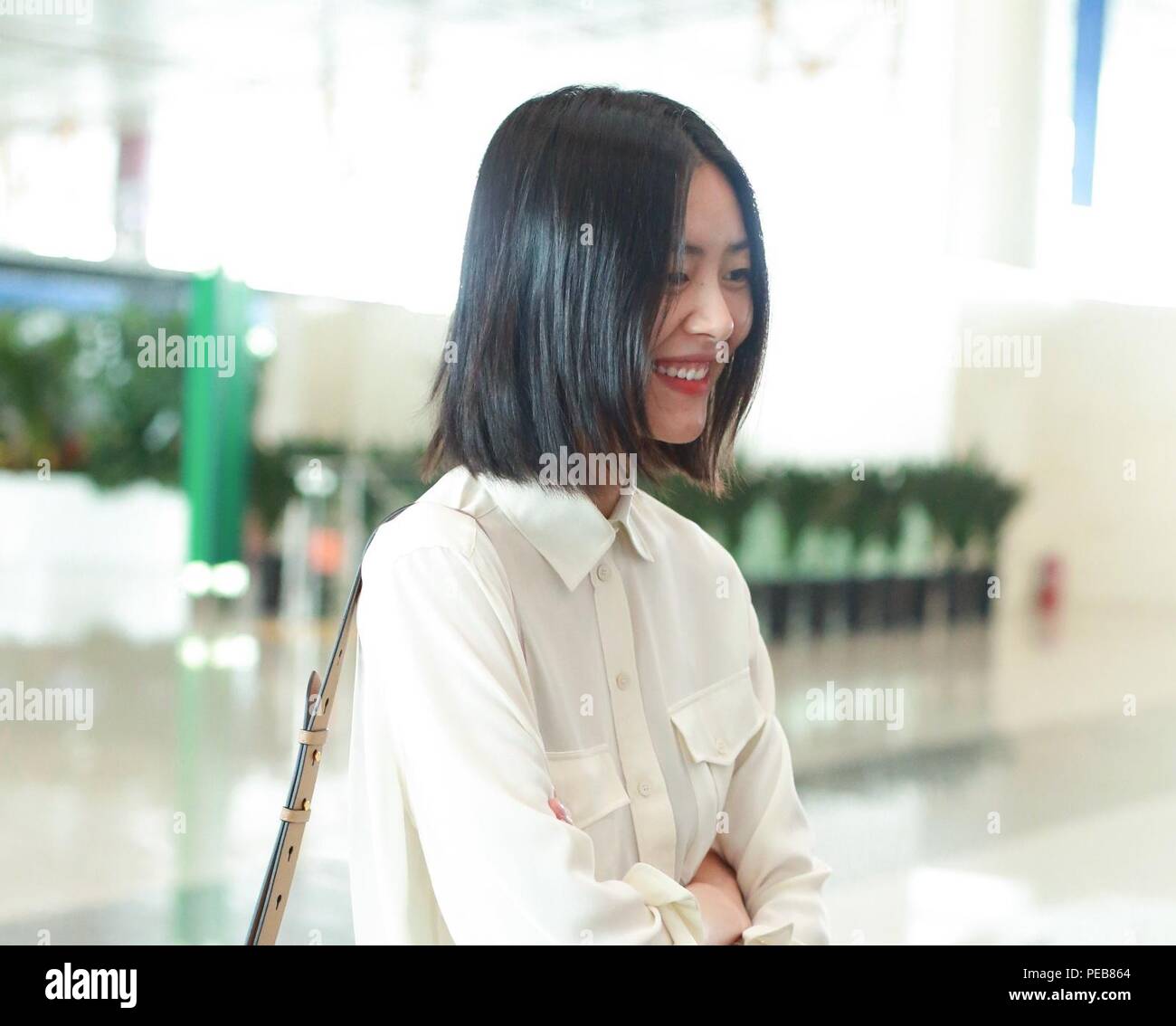 Beijin, Beijin, Cina. 14 Ago, 2018. Pechino, Cina-Victoria's Secret modello Liu Wen è macchiato all aeroporto di Pechino. Credito: SIPA Asia/ZUMA filo/Alamy Live News Foto Stock