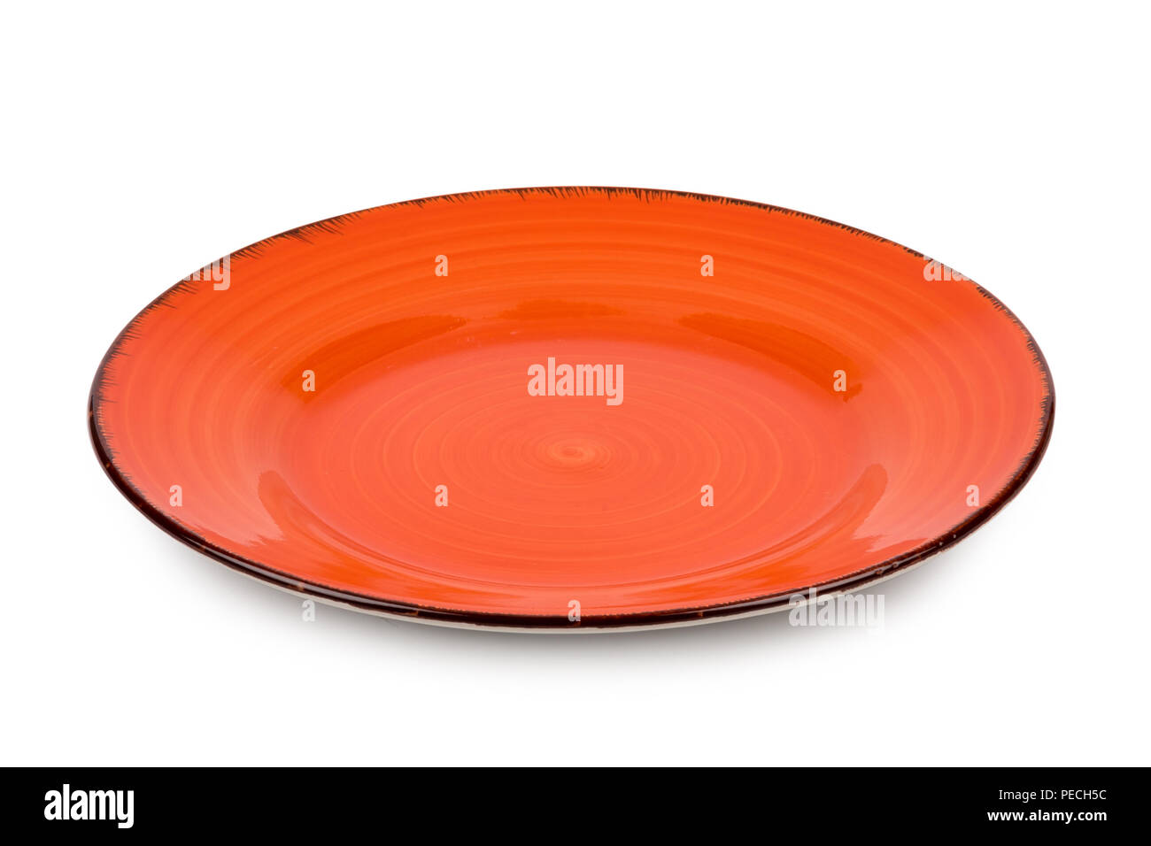 Arancione piastra in ceramica isolata su sfondo Foto Stock