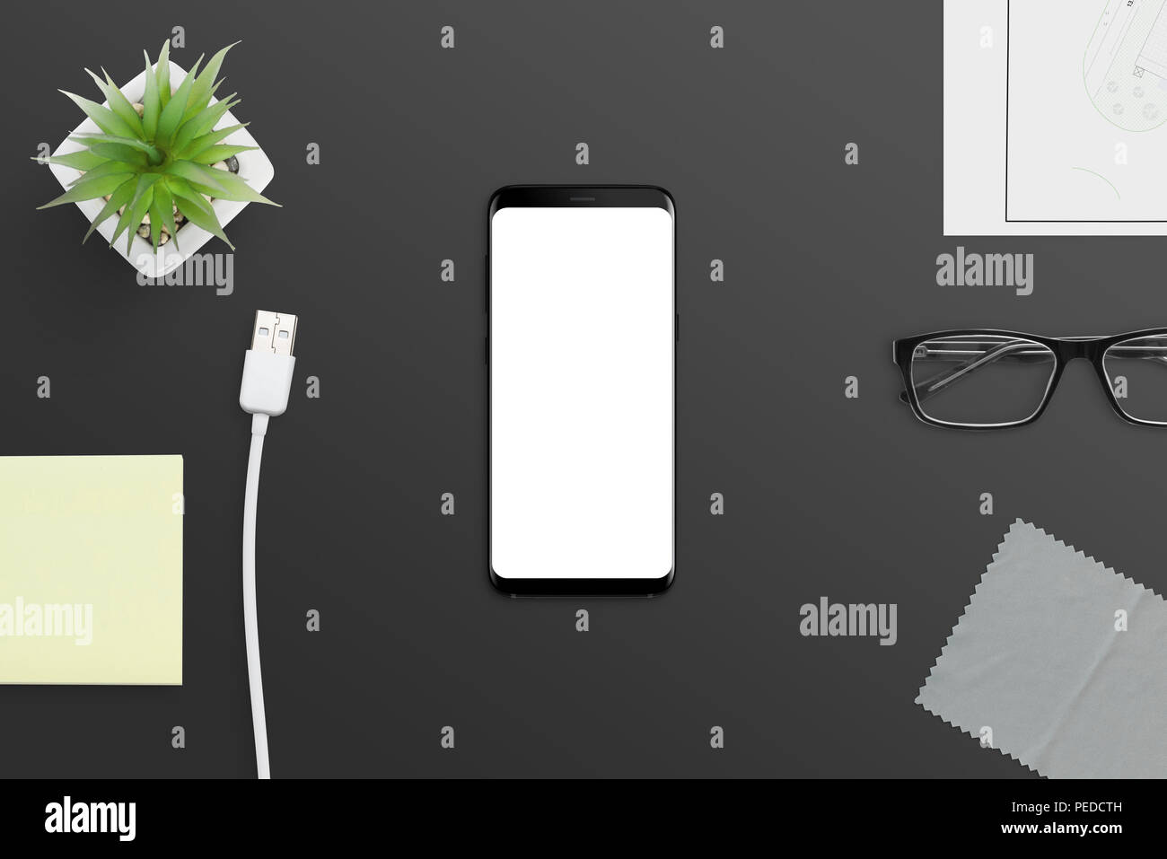 Smart phone mockup nero sulla scrivania in ufficio. Foto Stock
