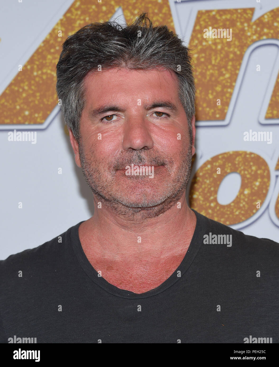 Hollywood, California, USA. 14 Ago, 2018. Simon Cowell arriva per il "America's Got Talent' Live Show di screening e tappeto rosso al Teatro Dolby. Credito: Lisa O'Connor/ZUMA filo/Alamy Live News Foto Stock
