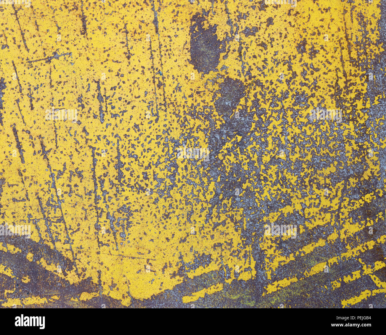 Usura della vernice gialla sul foglio di lamiera texture Foto Stock