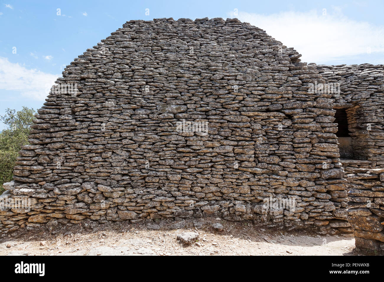 In pietra a secco di capanne in Village Des Bories, vicino a Gordes, Provenza, Francia. Foto Stock