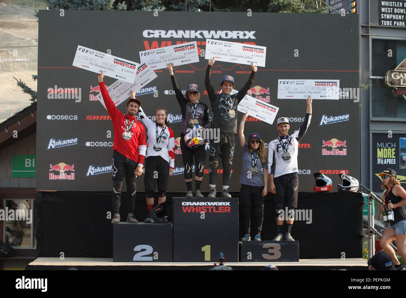 2018 pro uomini e donne pro del vincitore del podio, Crankworx Fox Air DH concorrenza in Whistler, BC, Canada. Agosto 15, 2018. Foto Stock