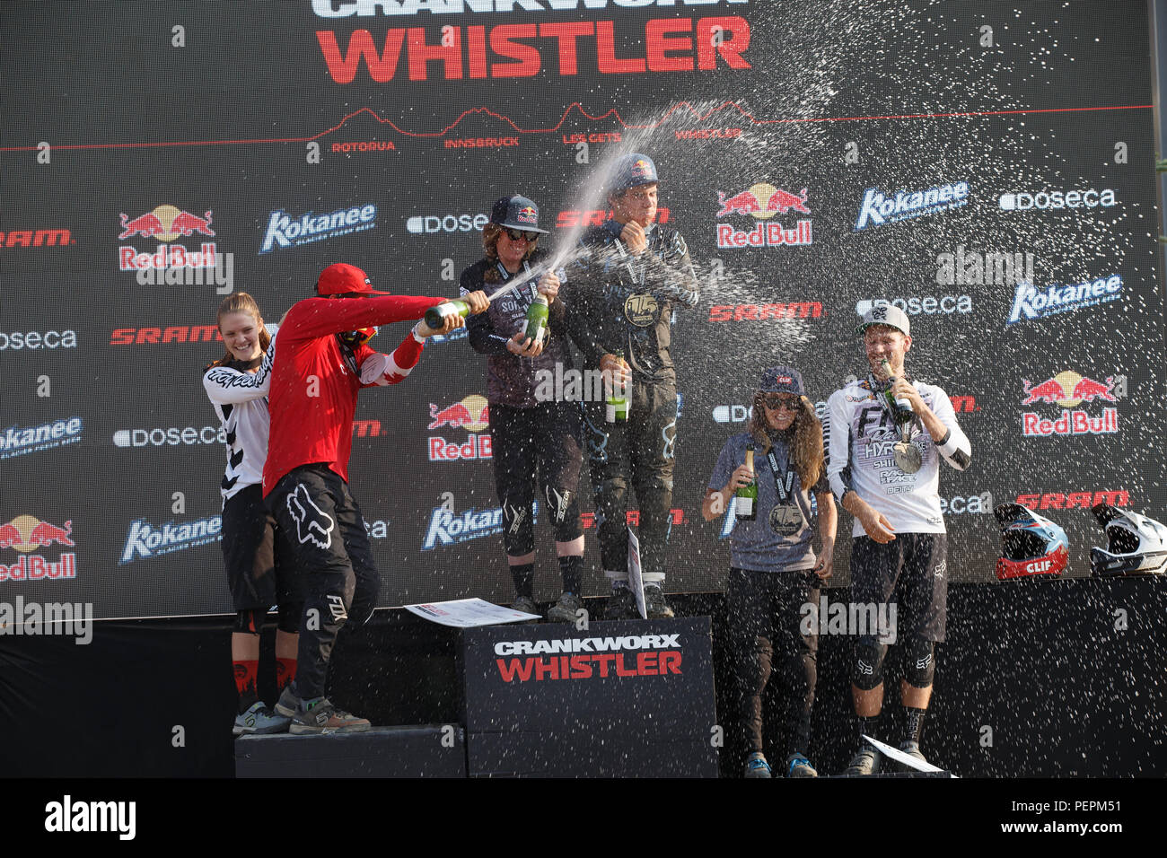 2018 pro uomini e donne pro del vincitore del podio, Crankworx Fox Air DH concorrenza in Whistler, BC, Canada. Agosto 15, 2018. Foto Stock