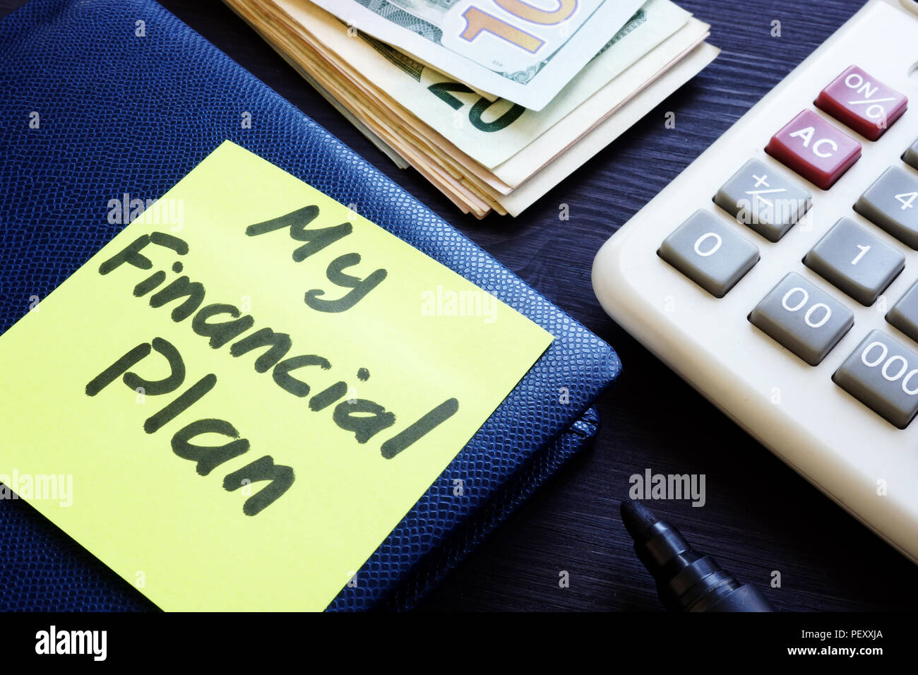 Il mio piano finanziario scritto su un memo stick. Foto Stock