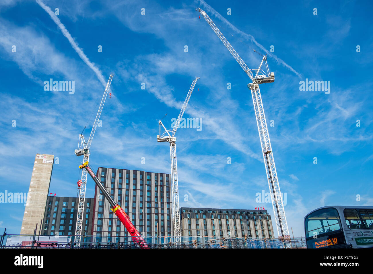 Manchester, Regno Unito - 25 Luglio 2018: lavori di costruzione nel centro della città di Manchester. Greater Manchester sta vivendo un boom edilizio. Foto Stock