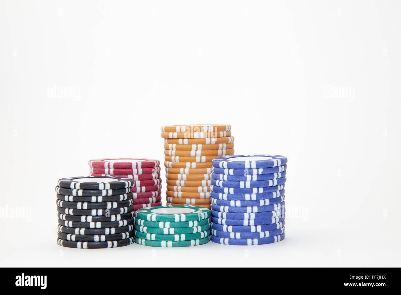 Impilati a cinque colori chip casino Foto Stock