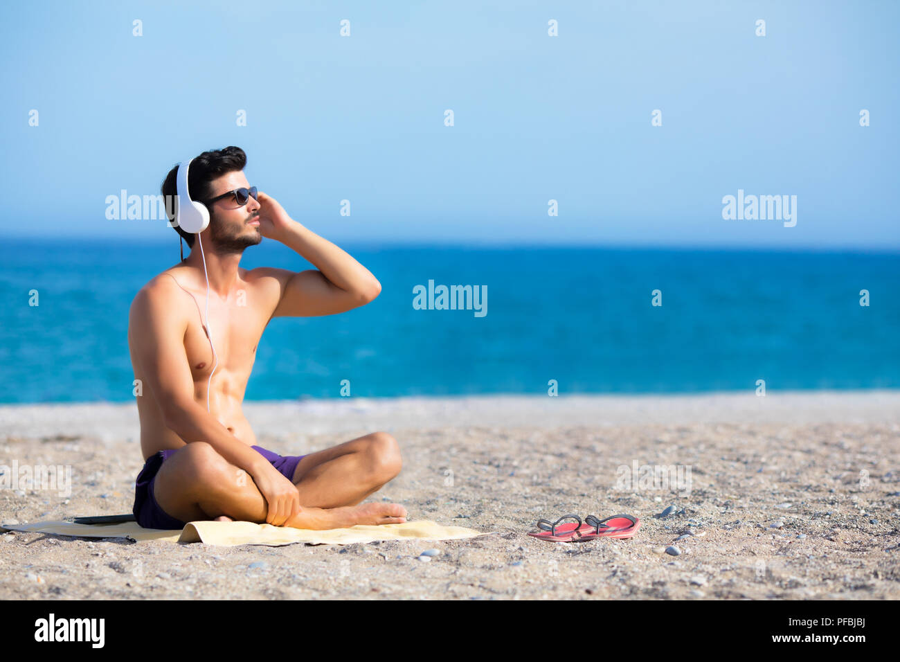 Per ascoltare la musica in spiaggia per i momenti di relax. Foto Stock