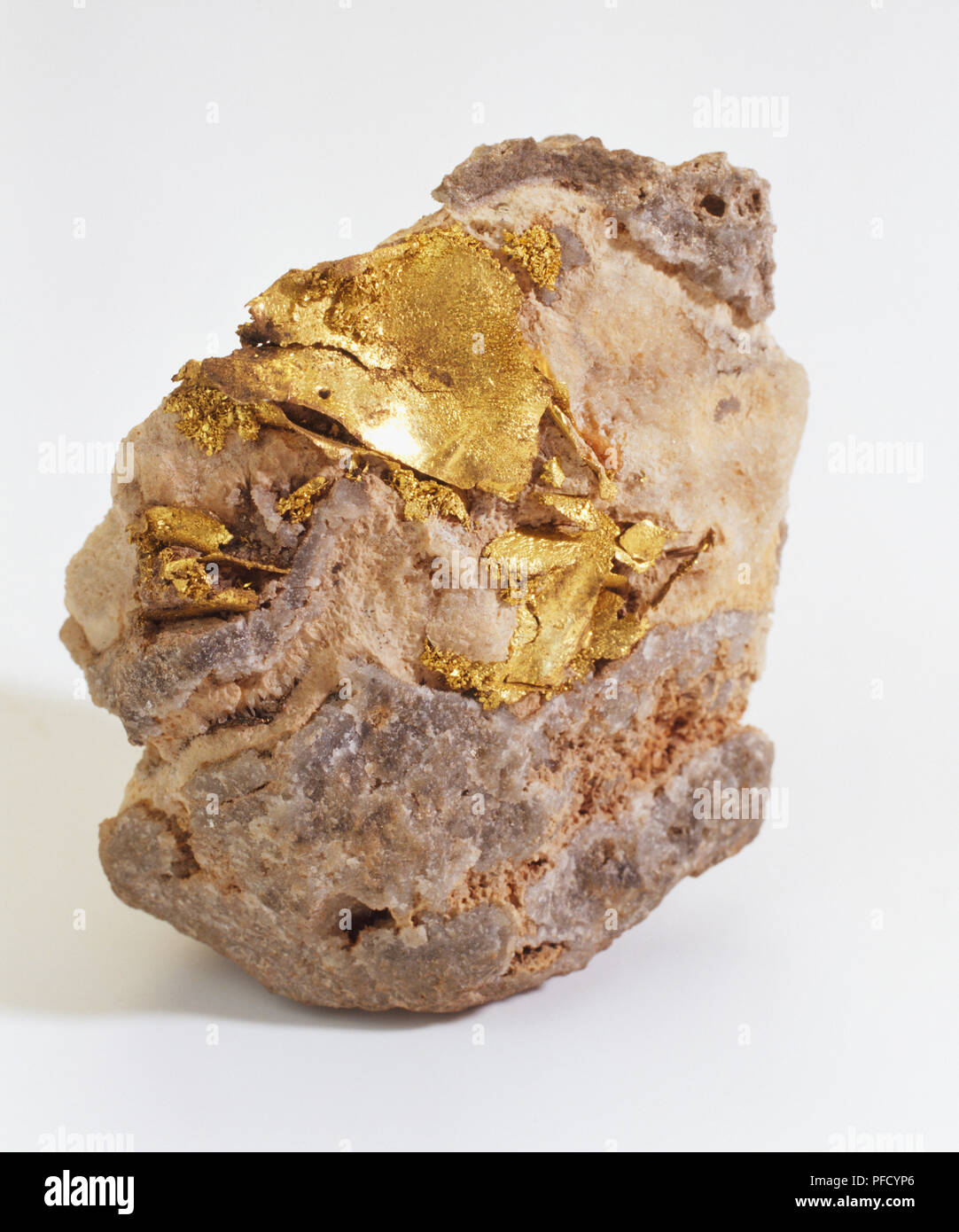 Piastre sottili di oro incorporato in quarzo, groundmass close up. Foto Stock