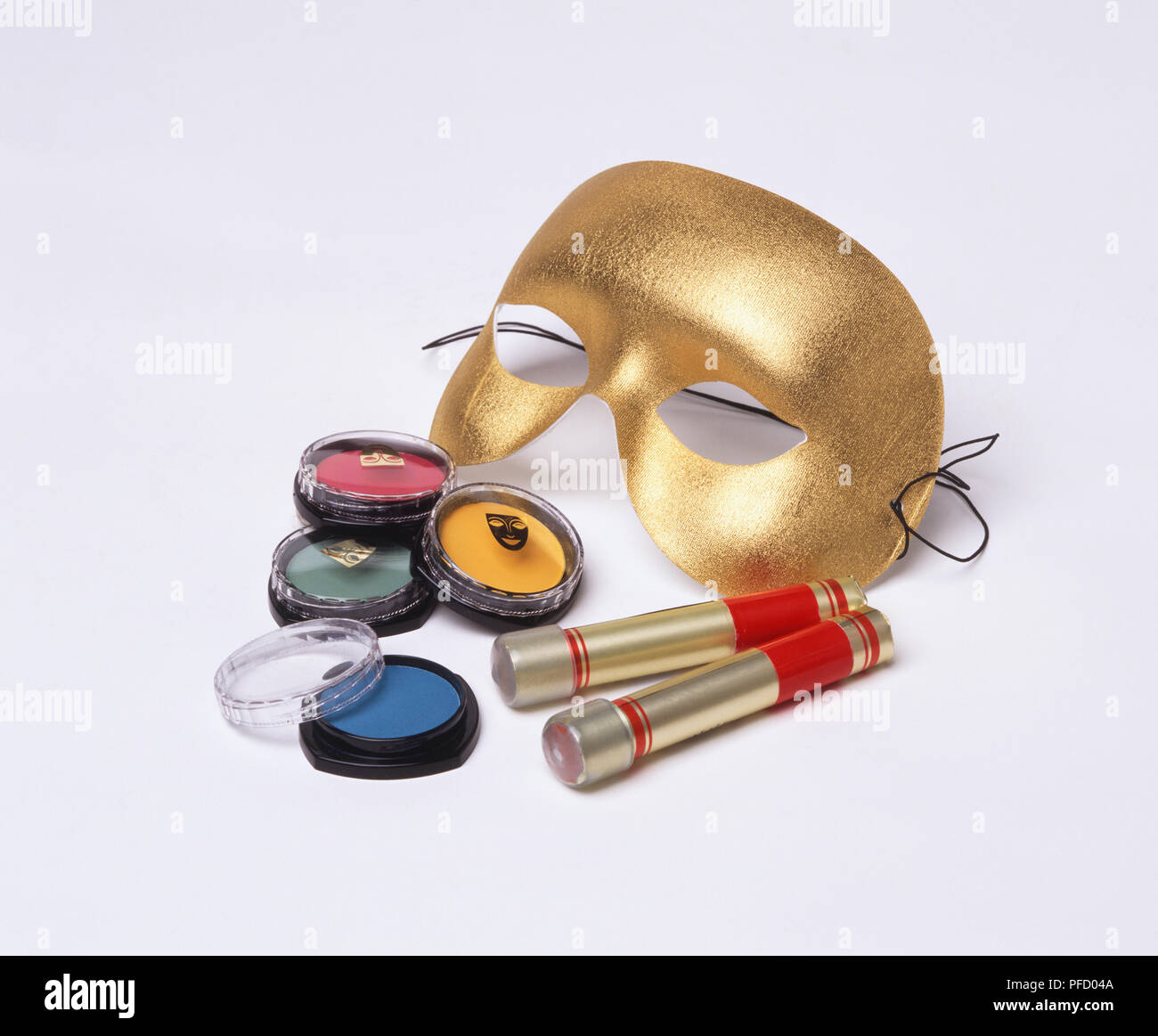 Maschera d'oro faccia colorati vernici e Rossetti, close up Foto Stock