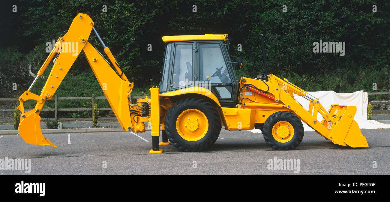 Pala e una benna fissata per il caricatore Foto Stock