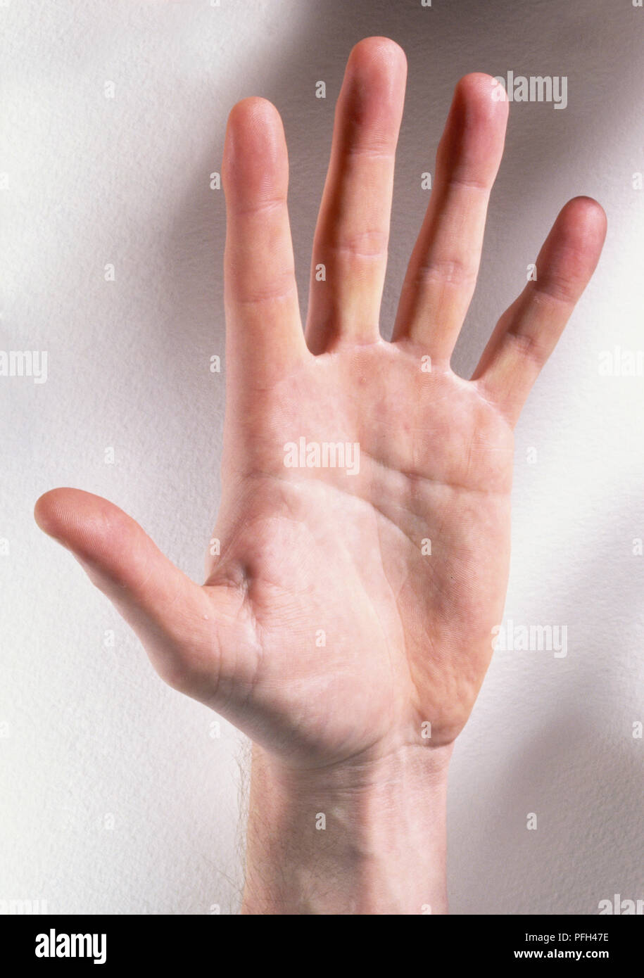 Palmo di una mano con il dito oltre Foto Stock
