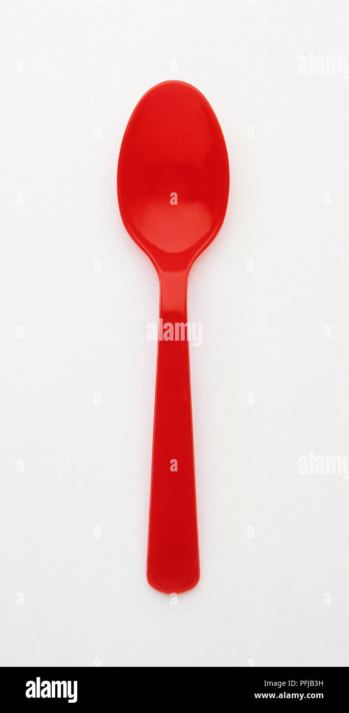 Rosso cucchiaio in plastica Foto Stock