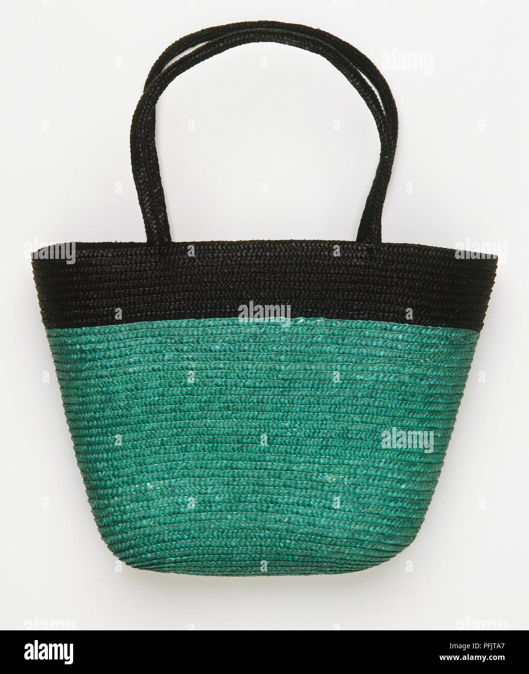 Un verde e nero borsa tessile Foto Stock