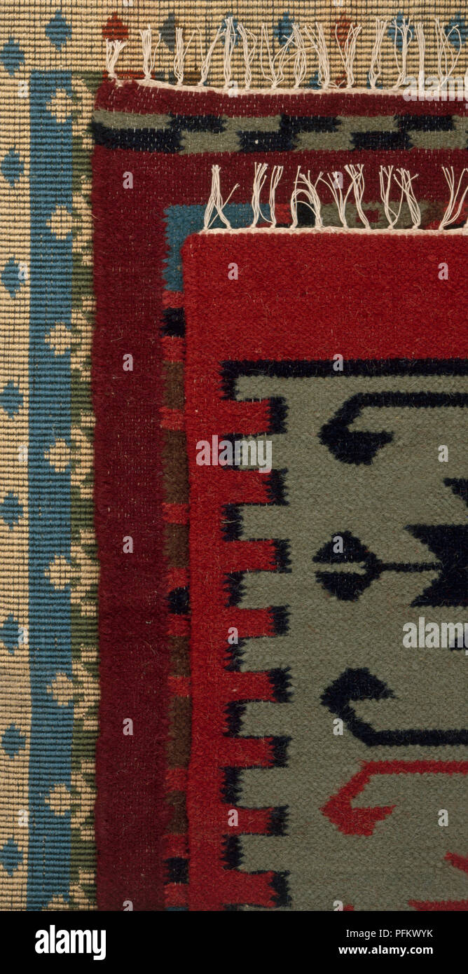Tre tessuti a mano tappeti, sulla sommità di un altro, close-up Foto Stock