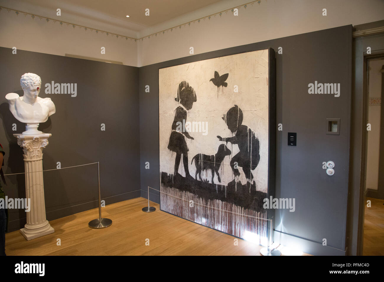 Banksy in esposizione presso MOCO museum di Amsterdam, Olanda Foto Stock