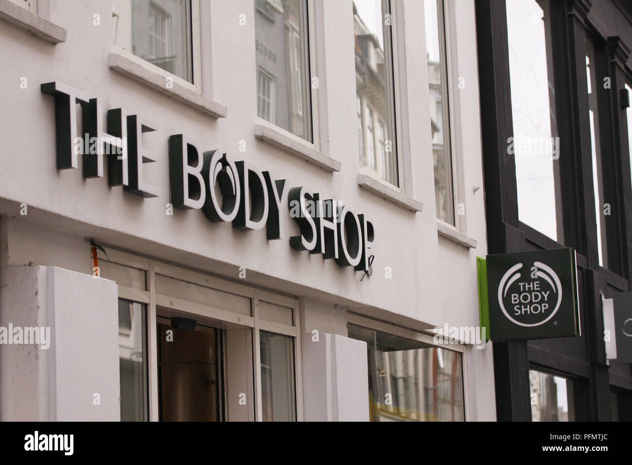 Copenhagen, Danimarca - 17 agosto: Il Body Shop logo sul segno sulla facciata. Il Body Shop, è un cittadino britannico di cosmetici, cura della pelle e della società di profumo Foto Stock