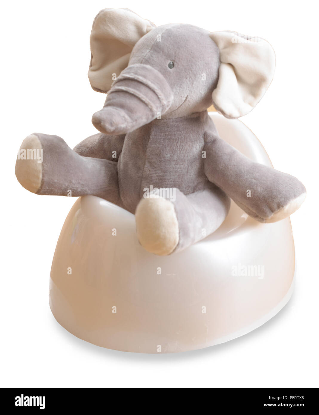 Elefante giocattolo seduto sul vasino Foto Stock