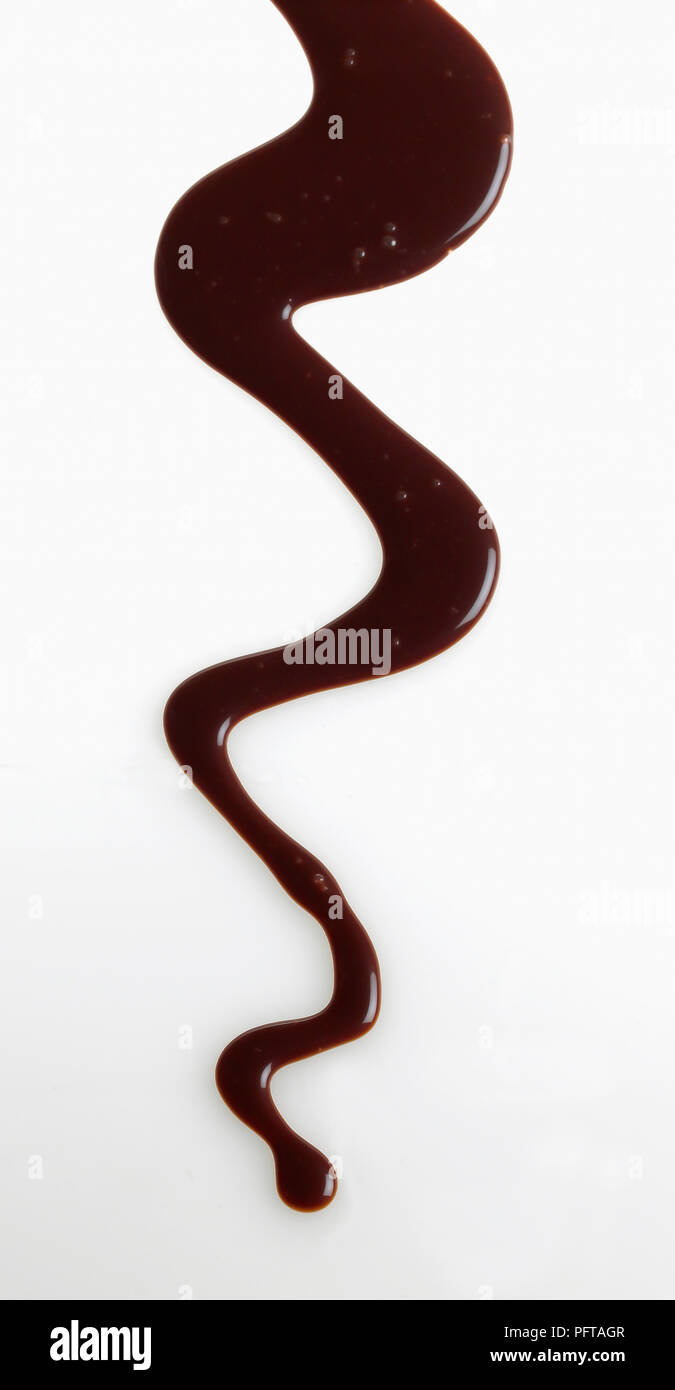 Salsa al cioccolato sciroppo Foto Stock