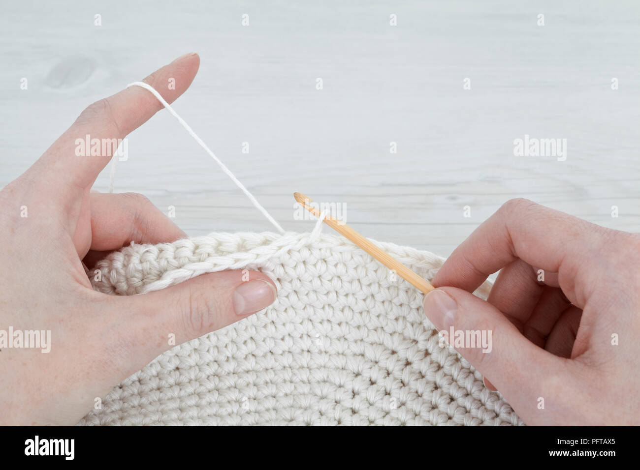 A crochet cuscino tondo Foto Stock